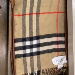 authentic Burberry scarf , in pristine condition.